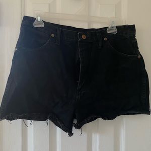 Black Wrangler high waisted cutoff shorts